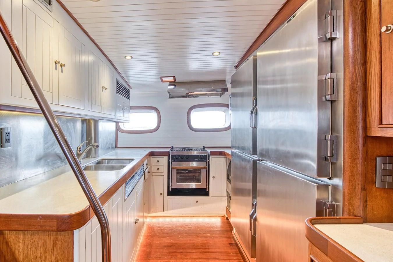 a kitchen with a glass shower aboard ARIA Yacht for Sale