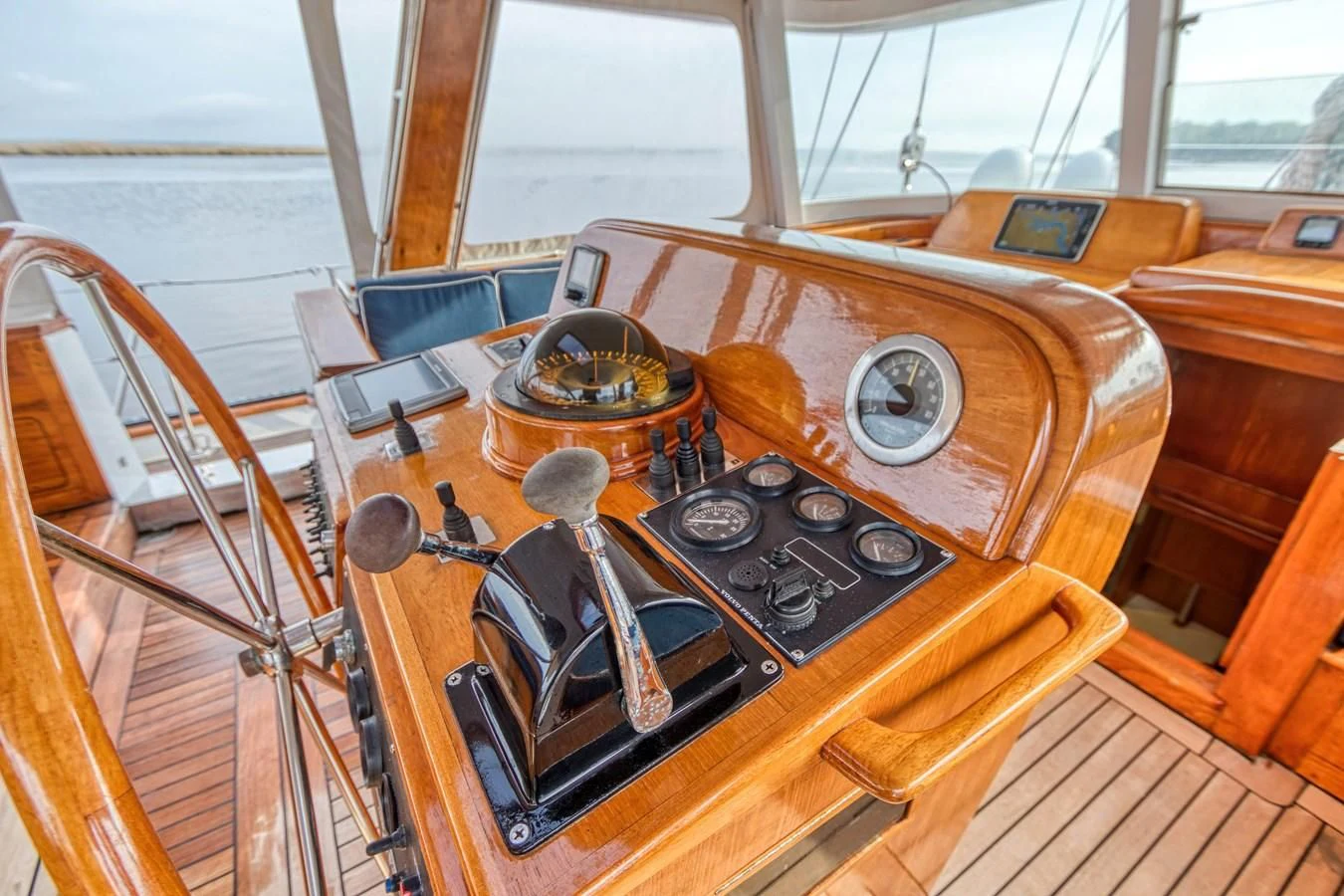 a wooden radio with a record player aboard ARIA Yacht for Sale