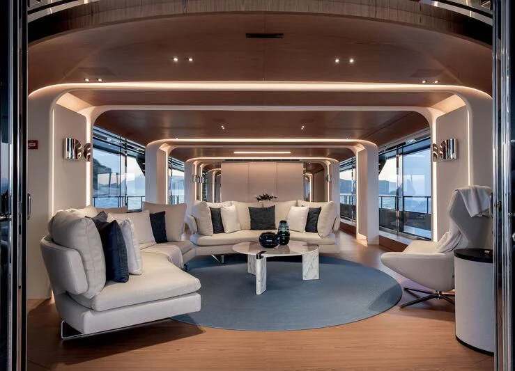 a living room with a large window aboard LEGEND Yacht for Sale