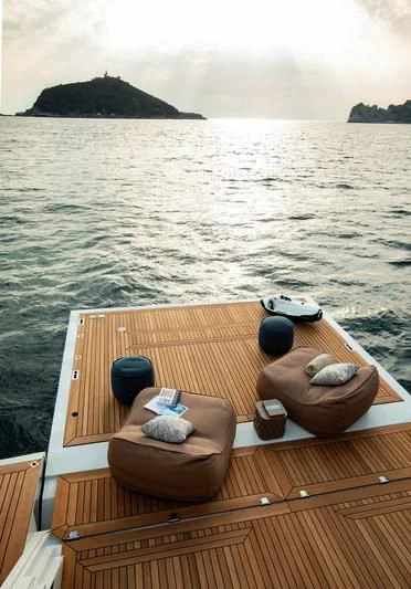 a boat with a group of hats on it aboard LEGEND Yacht for Sale