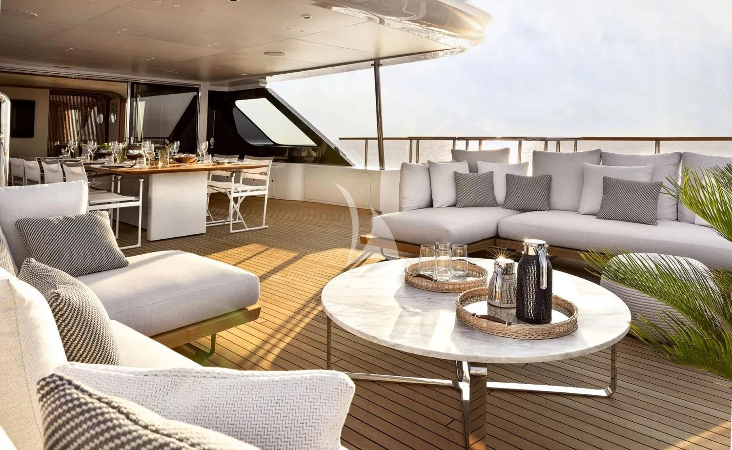 a living room with a large patio aboard LEGEND Yacht for Sale