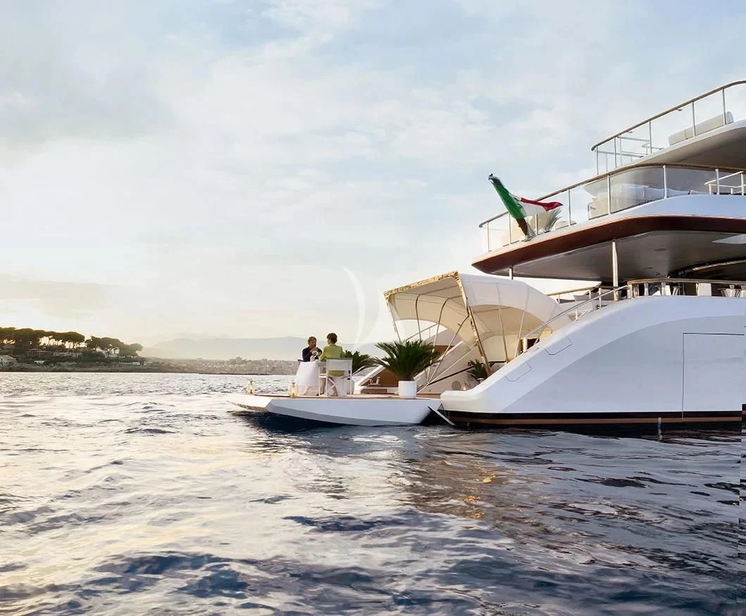 a couple people on a boat aboard LEGEND Yacht for Sale