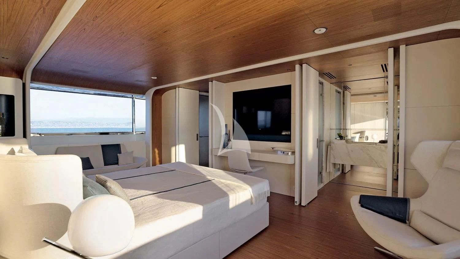 a room with a bed and a television aboard LEGEND Yacht for Sale