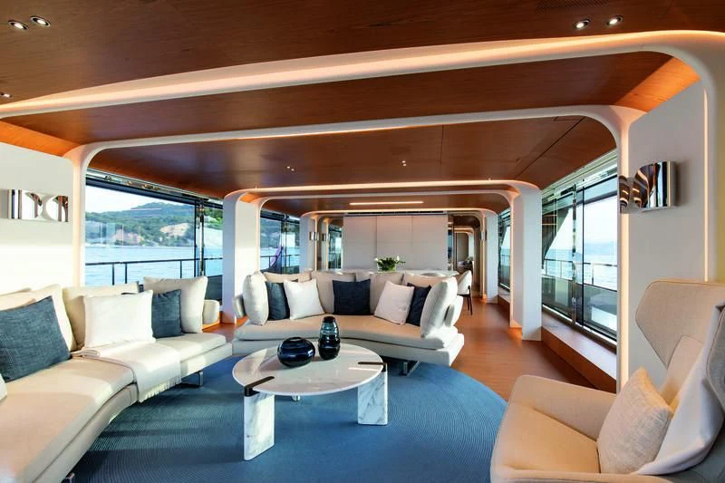 a living room with a large window aboard LEGEND Yacht for Sale