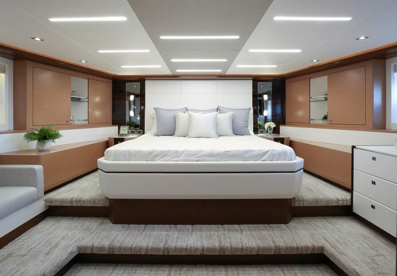 a large bedroom with a large bed aboard CHILLAXIN' Yacht for Sale