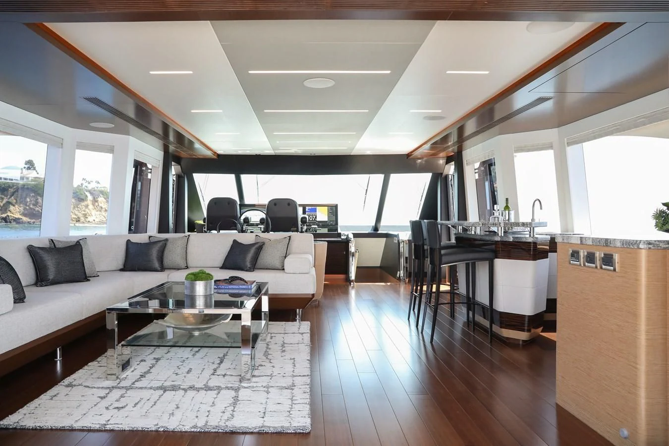 a living room with a large window aboard CHILLAXIN' Yacht for Sale