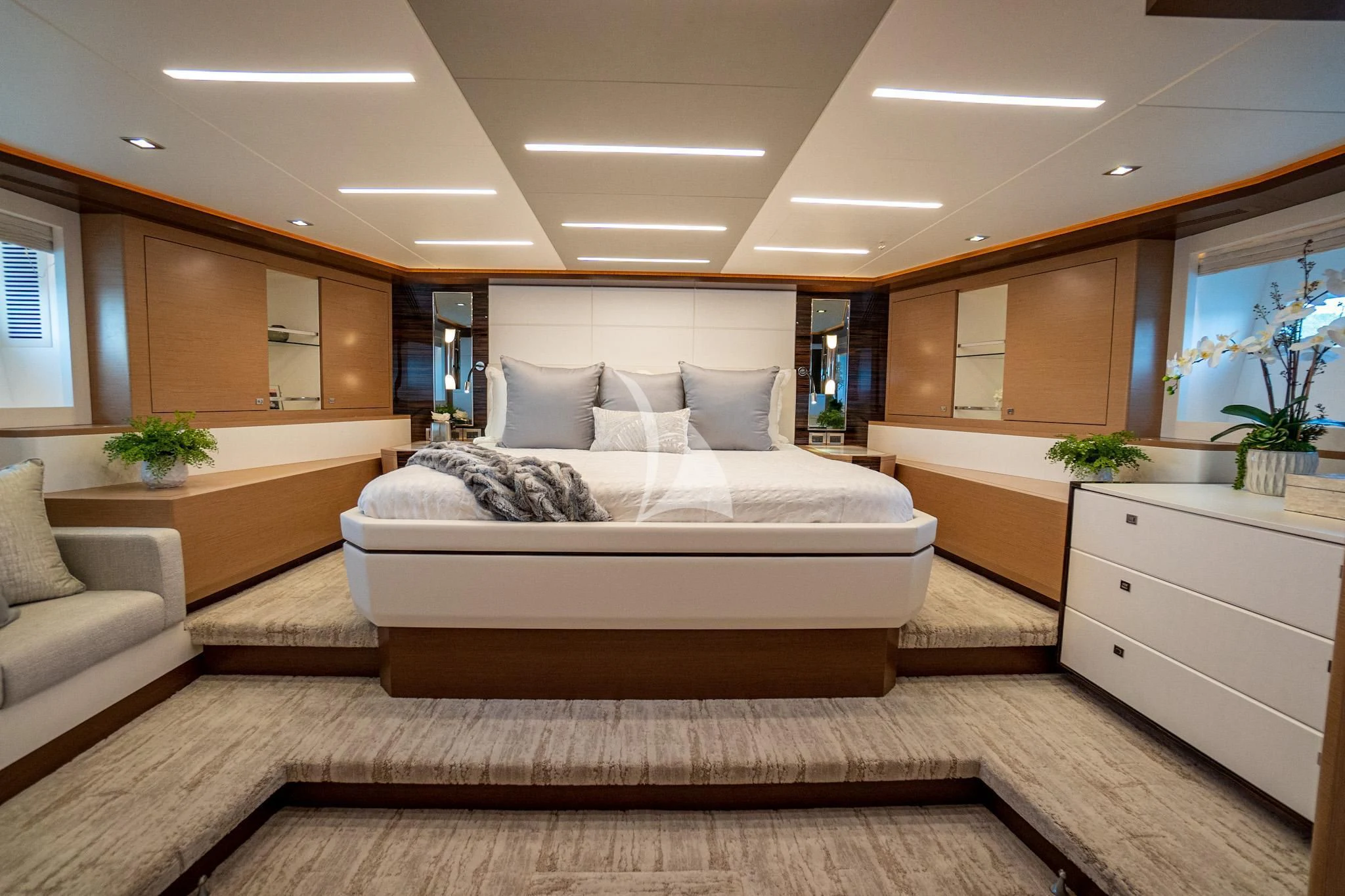 a large white bed in a room aboard CHILLAXIN' Yacht for Sale