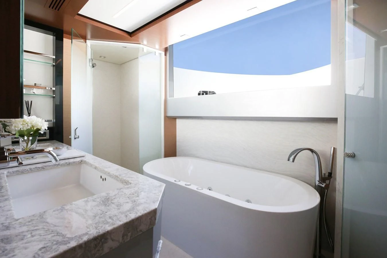 a bathroom with a tub sink and a shower aboard CHILLAXIN' Yacht for Sale