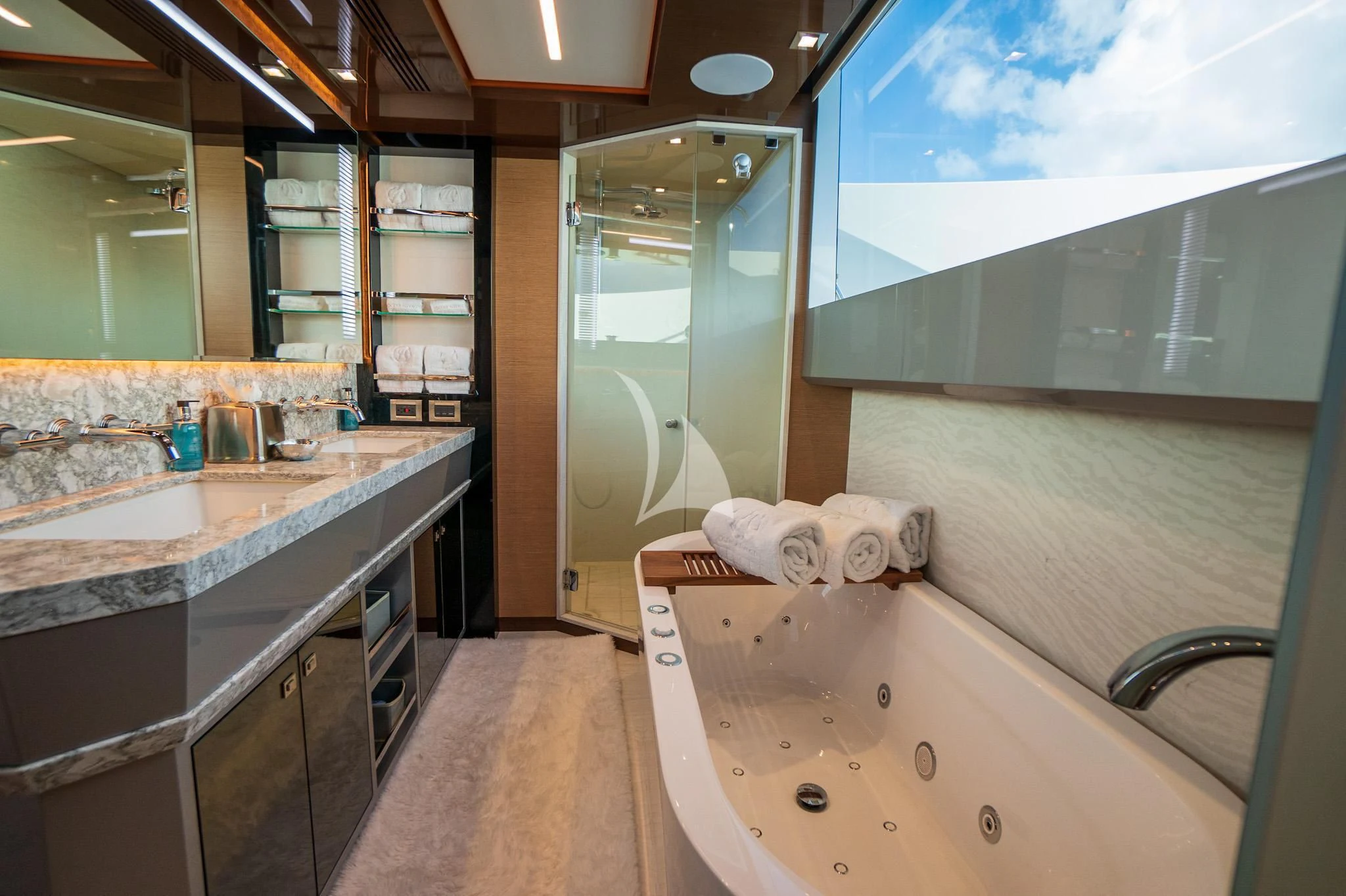 a bathroom with a large bathtub aboard CHILLAXIN' Yacht for Sale