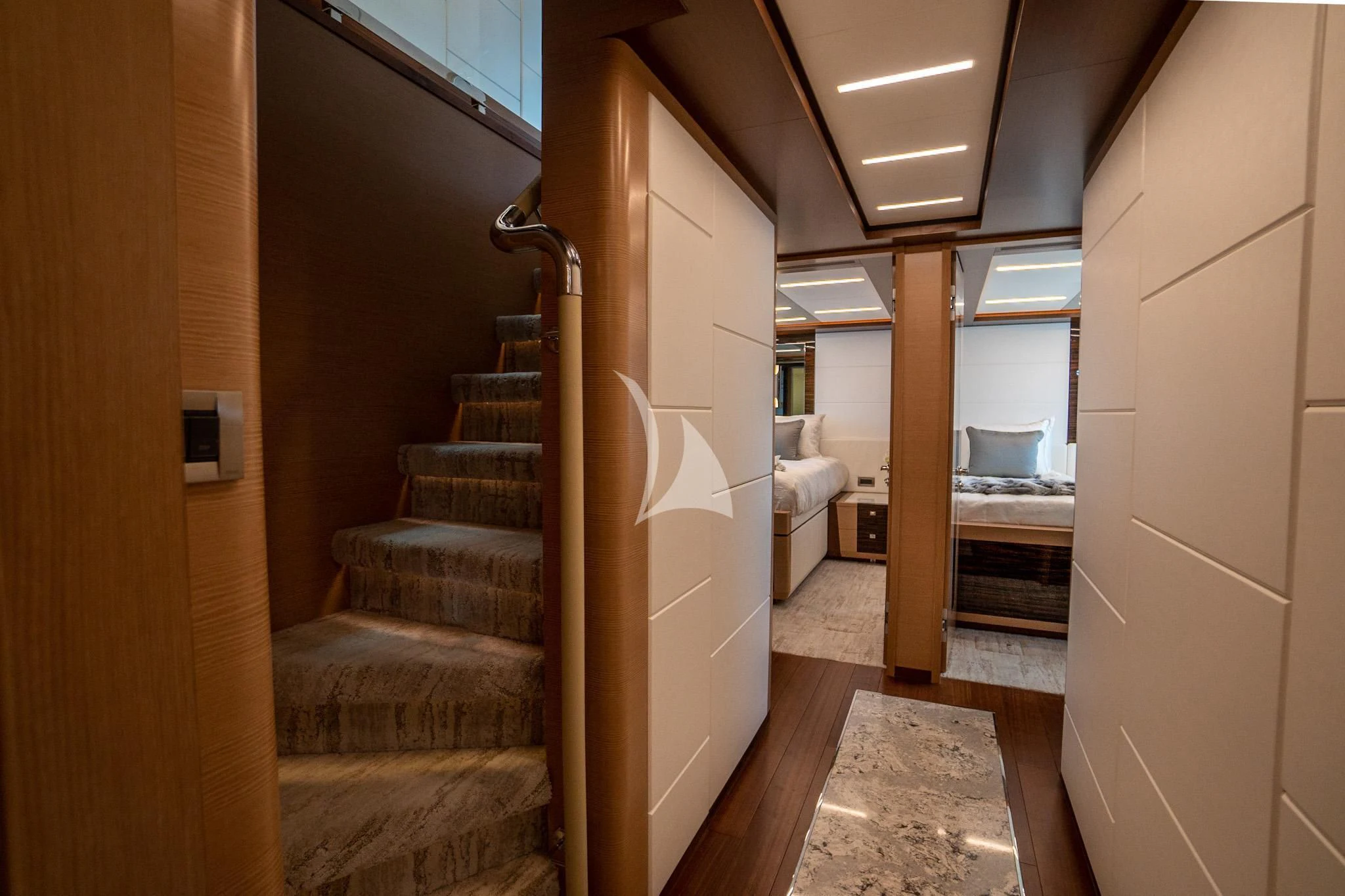 a hallway with a couch and a door aboard CHILLAXIN' Yacht for Sale