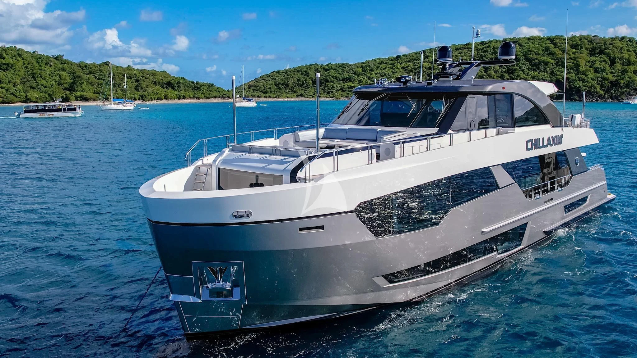 a white boat in the water aboard CHILLAXIN' Yacht for Sale