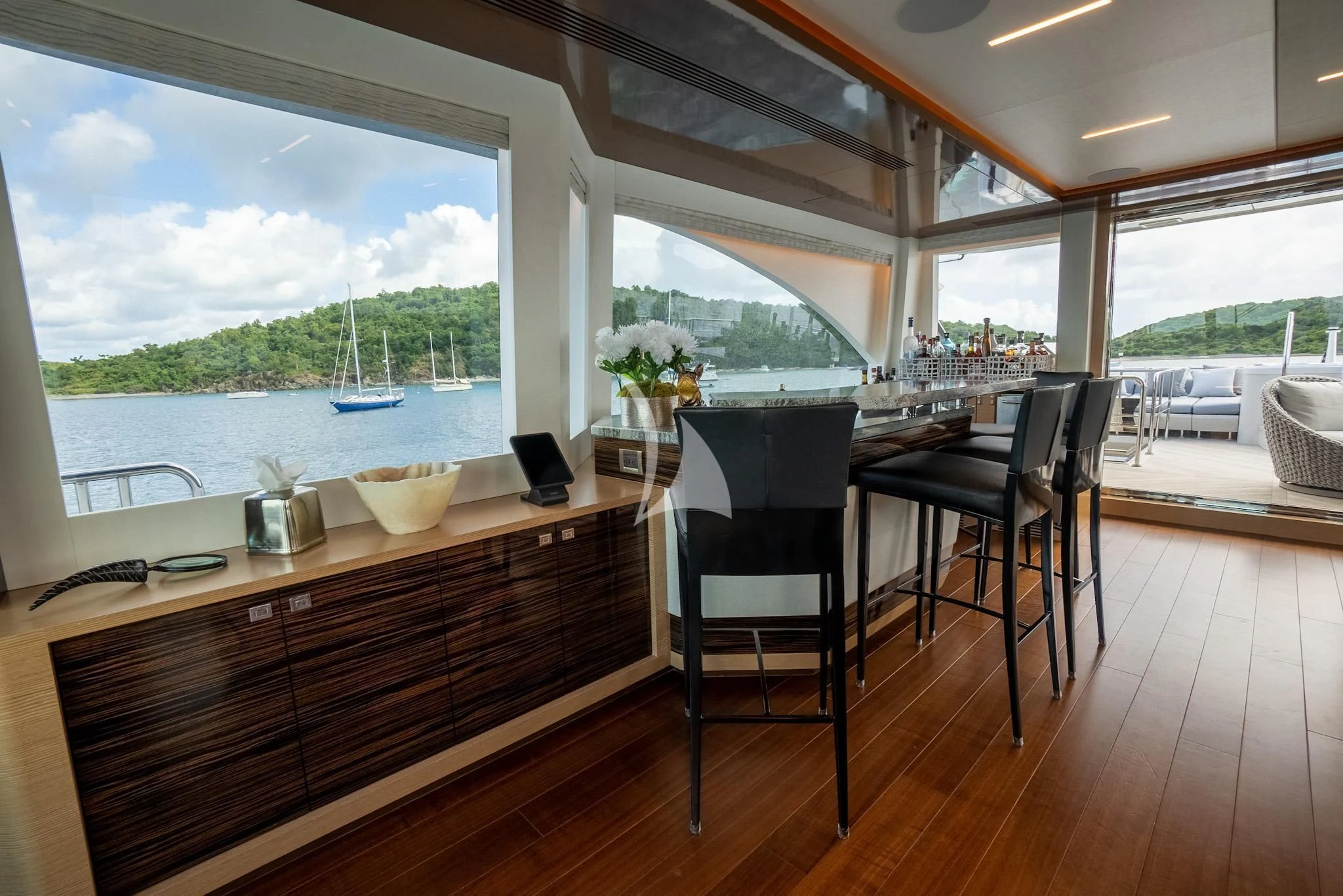 a room with a table and chairs aboard CHILLAXIN' Yacht for Sale