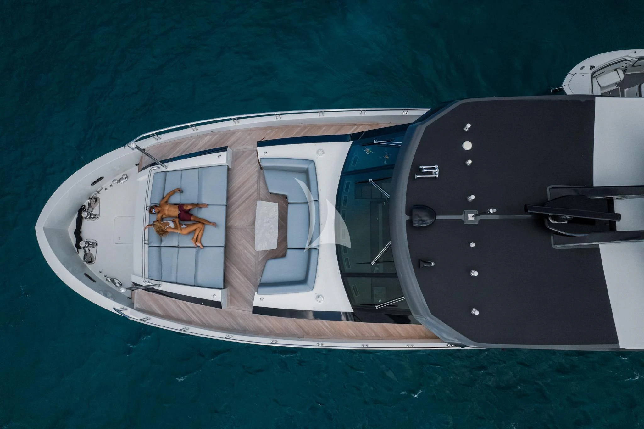 a boat with a person on it aboard CHILLAXIN' Yacht for Sale