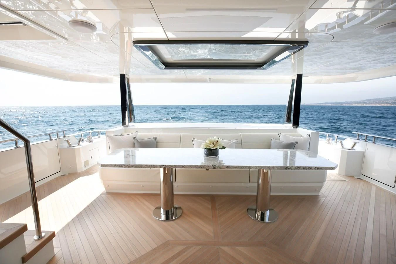 a room with a table and chairs aboard CHILLAXIN' Yacht for Sale