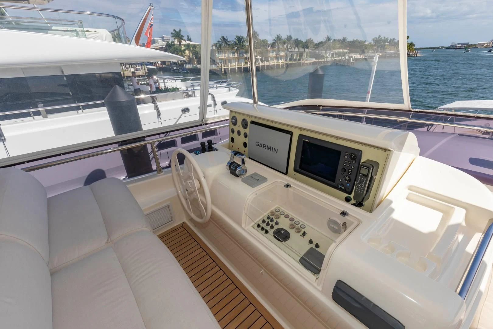 a boat with a deck and a boat in the water aboard MI RX Yacht for Sale