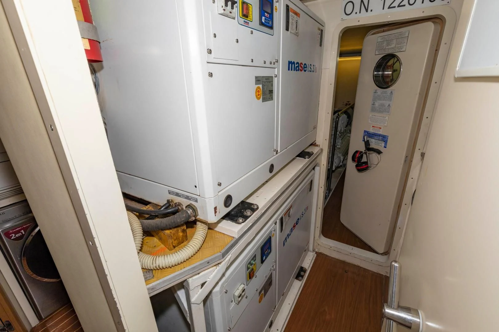 a machine with a door open aboard MI RX Yacht for Sale