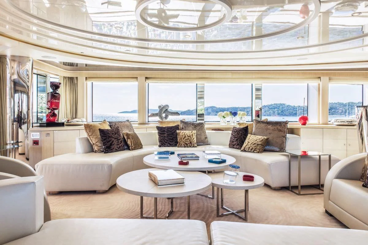 a living room with a large window aboard ELENI Yacht for Sale