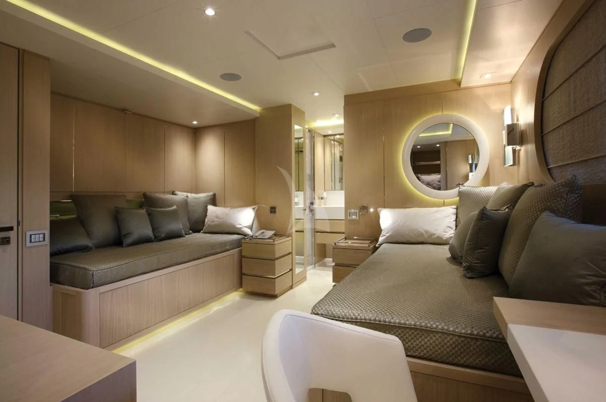 a large living room with a couch aboard ELENI Yacht for Sale