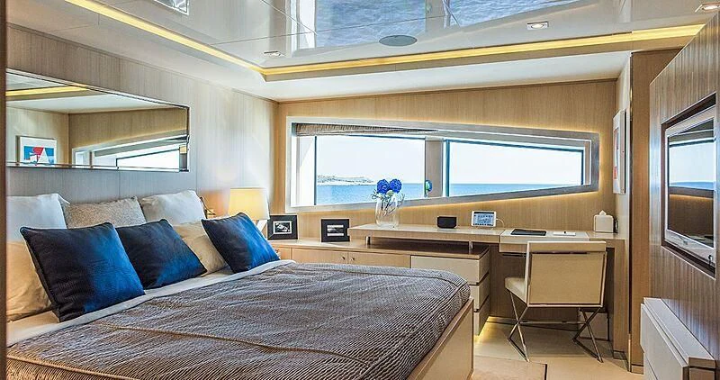 a bed in a room aboard ELENI Yacht for Sale