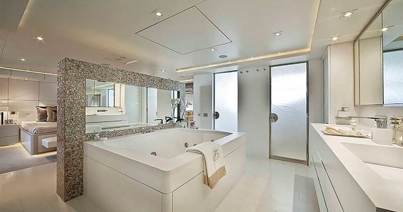 a large bathroom with a large tub aboard ELENI Yacht for Sale