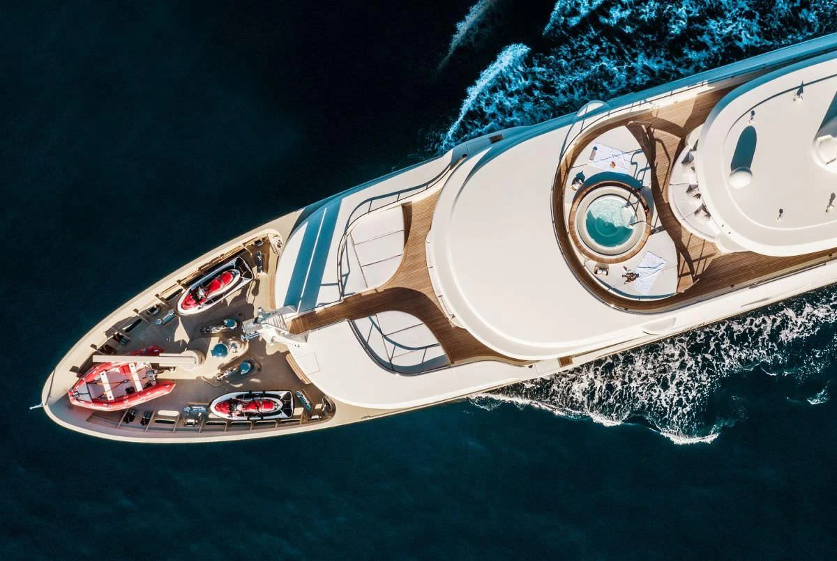 a space shuttle flying over the earth aboard ELENI Yacht for Sale