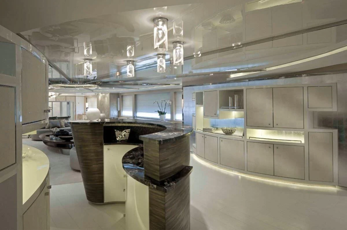 a room with a few sinks and a large mirror aboard ELENI Yacht for Sale