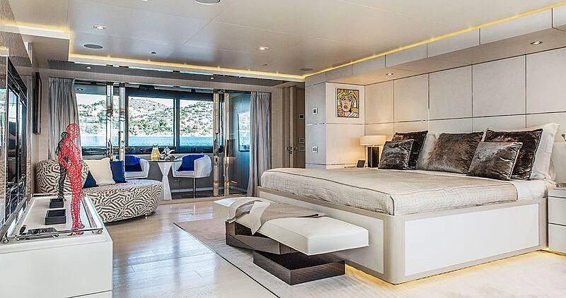a living room with a large window aboard ELENI Yacht for Sale