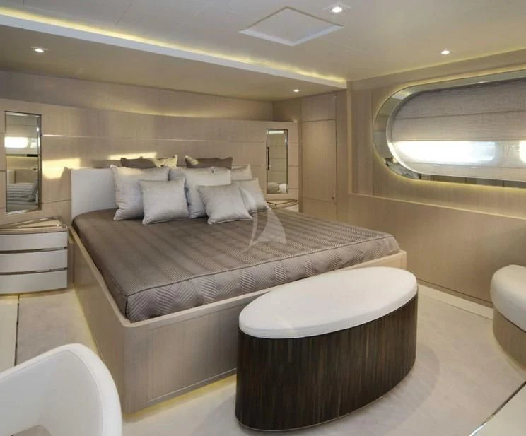 a large bed in a room aboard ELENI Yacht for Sale
