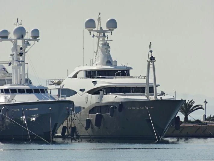 a large white boat sits in the water aboard ELENI Yacht for Sale