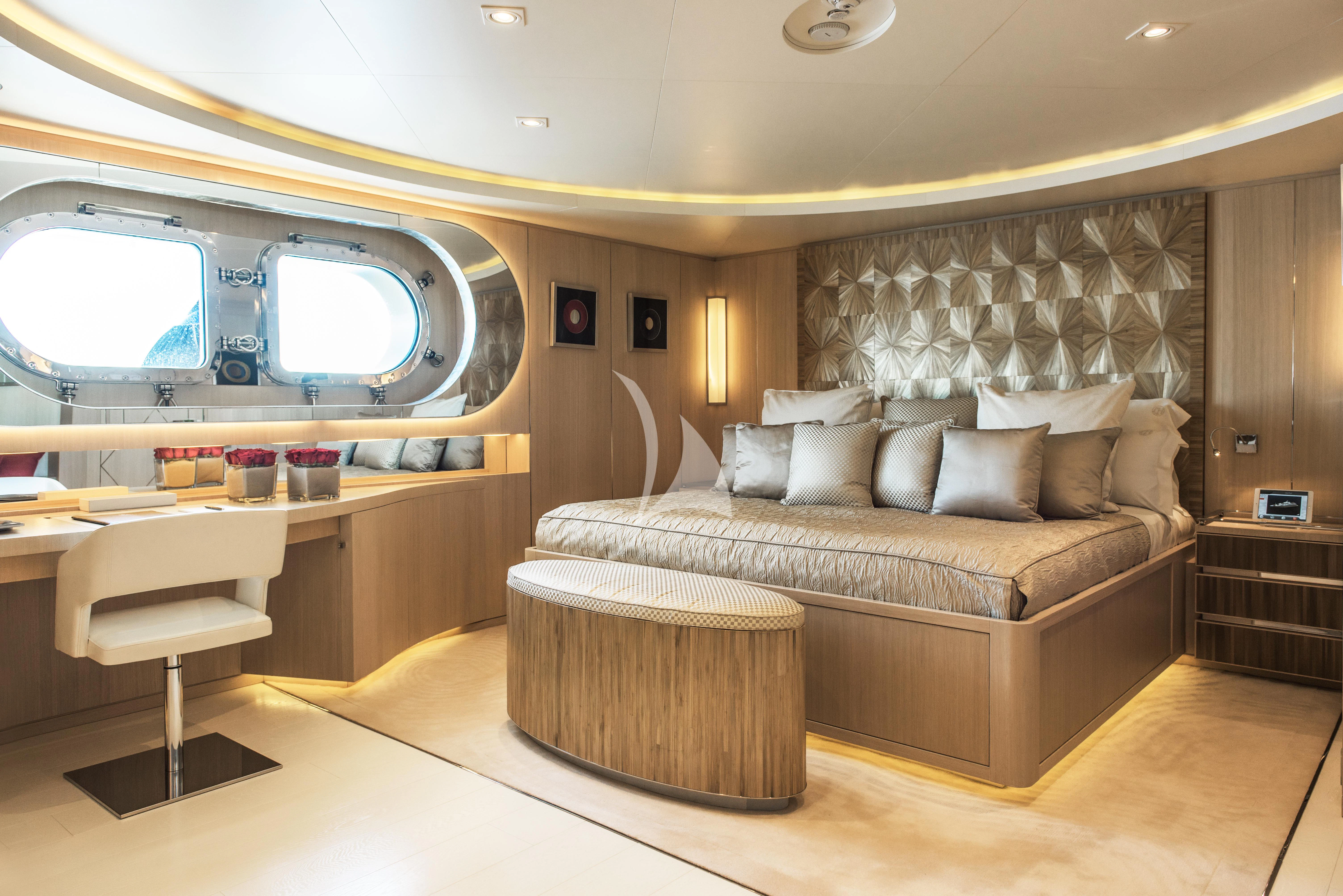 a bed in a room aboard ELENI Yacht for Sale