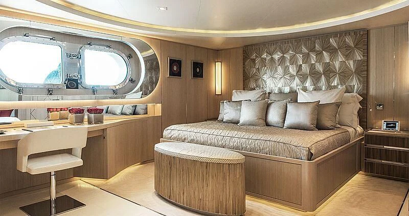 a bed in a room aboard ELENI Yacht for Sale