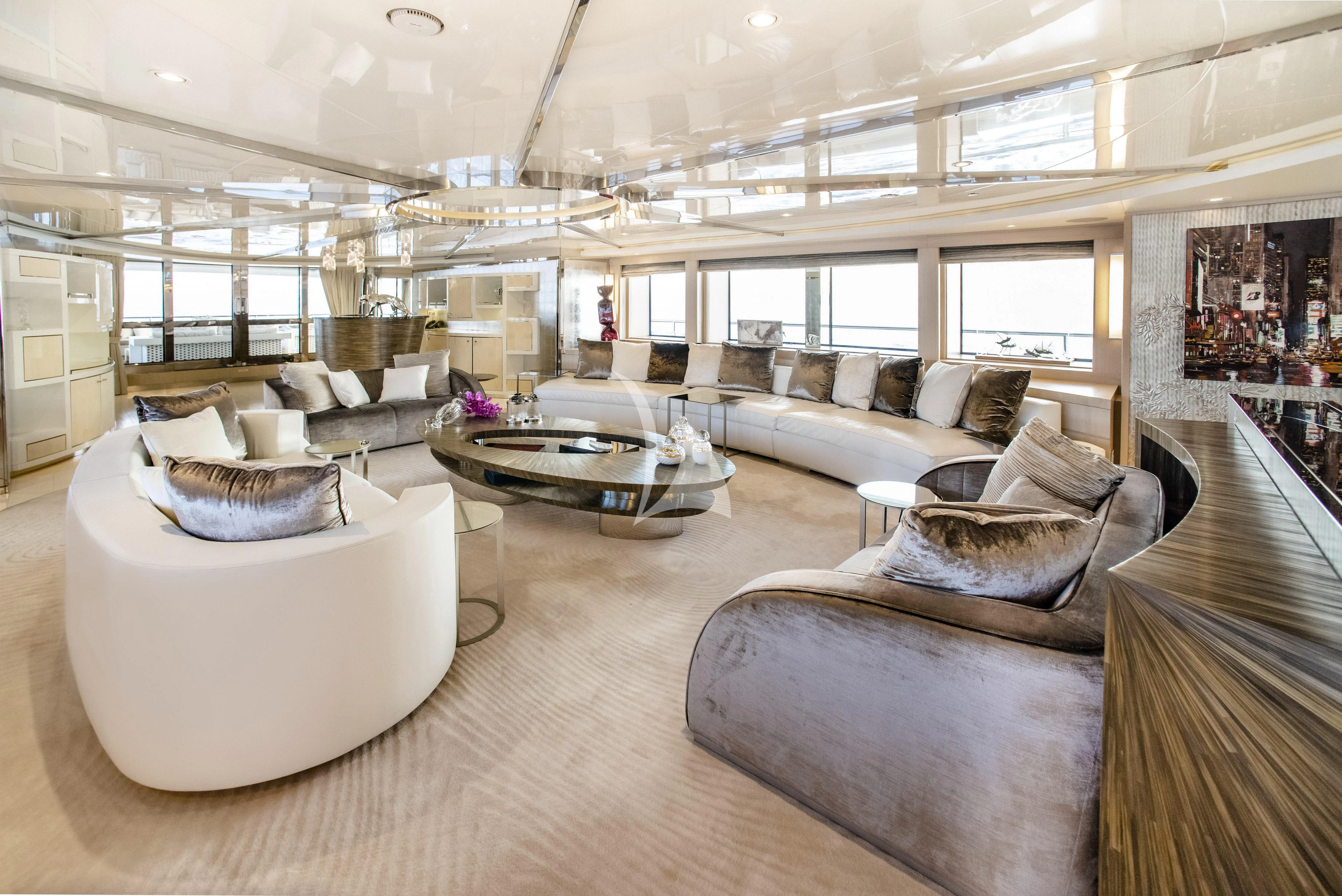 a large living room with a large window aboard ELENI Yacht for Sale
