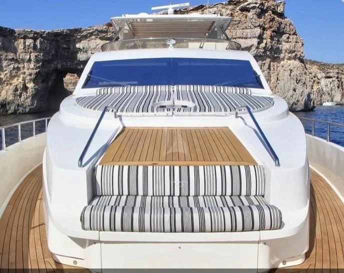 a white and blue striped car aboard FUNSEA Yacht for Sale