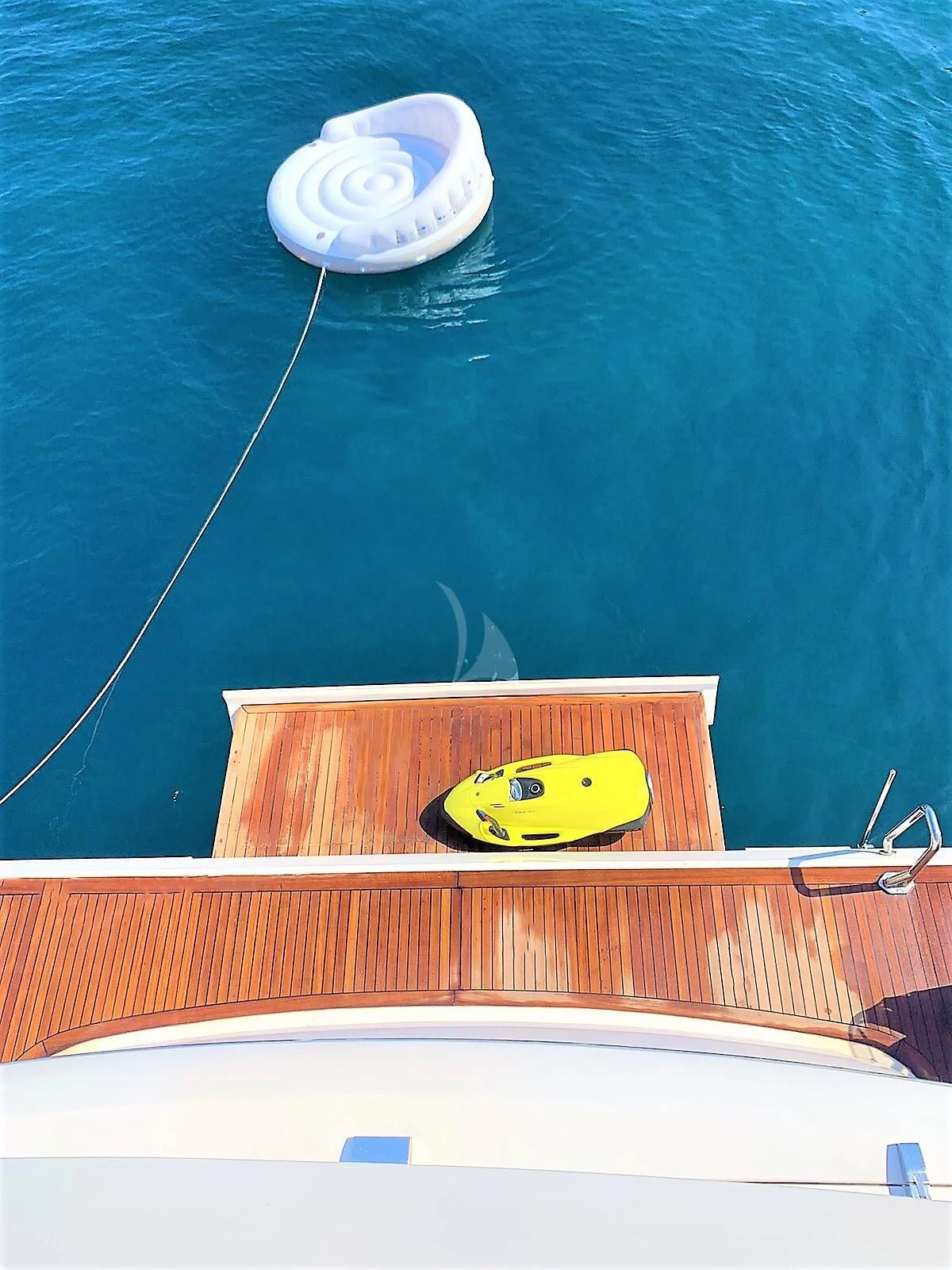 a yellow object on a wood shelf aboard FUNSEA Yacht for Sale