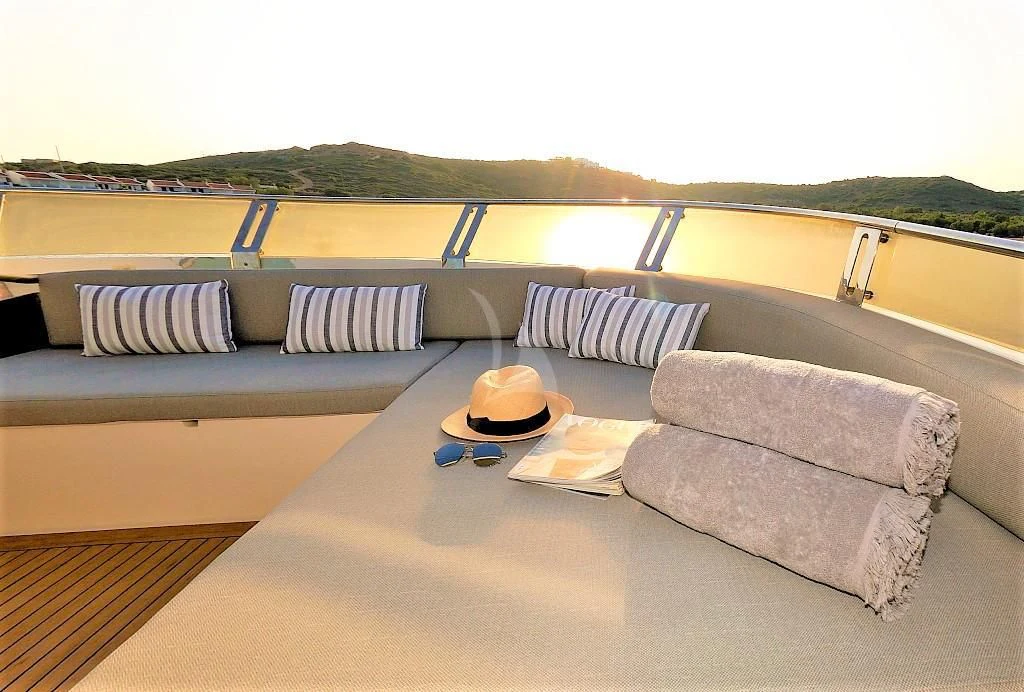 a couch and a table on a boat aboard FUNSEA Yacht for Sale