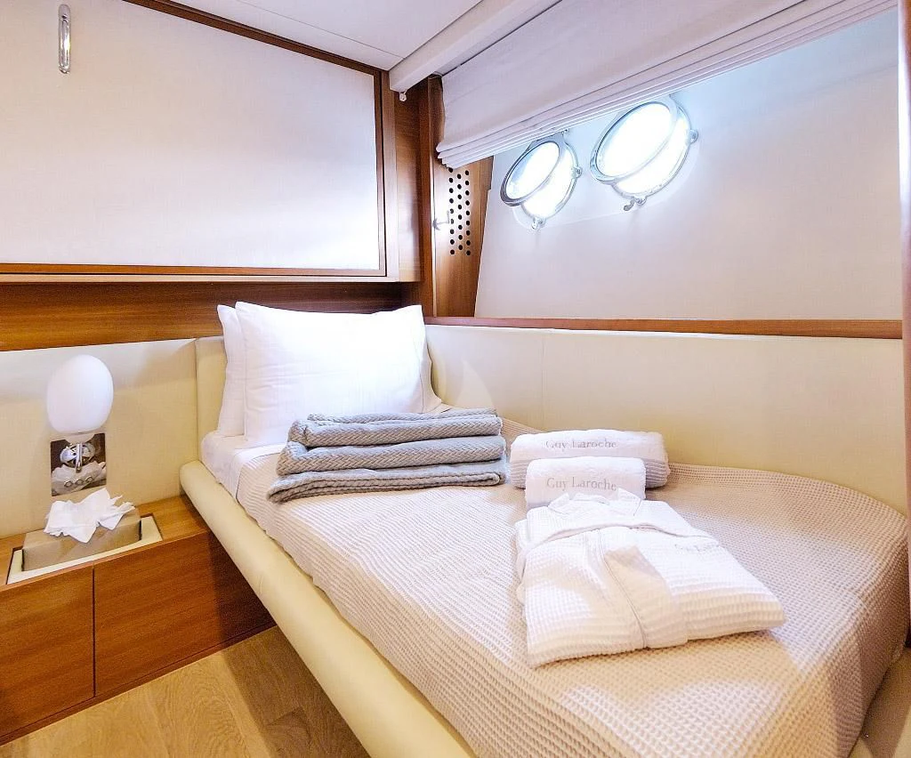a room with two beds aboard FUNSEA Yacht for Sale