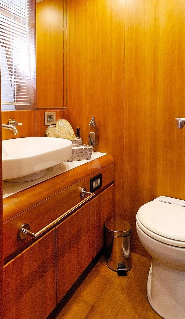 a bathroom with a sink and toilet aboard FUNSEA Yacht for Sale