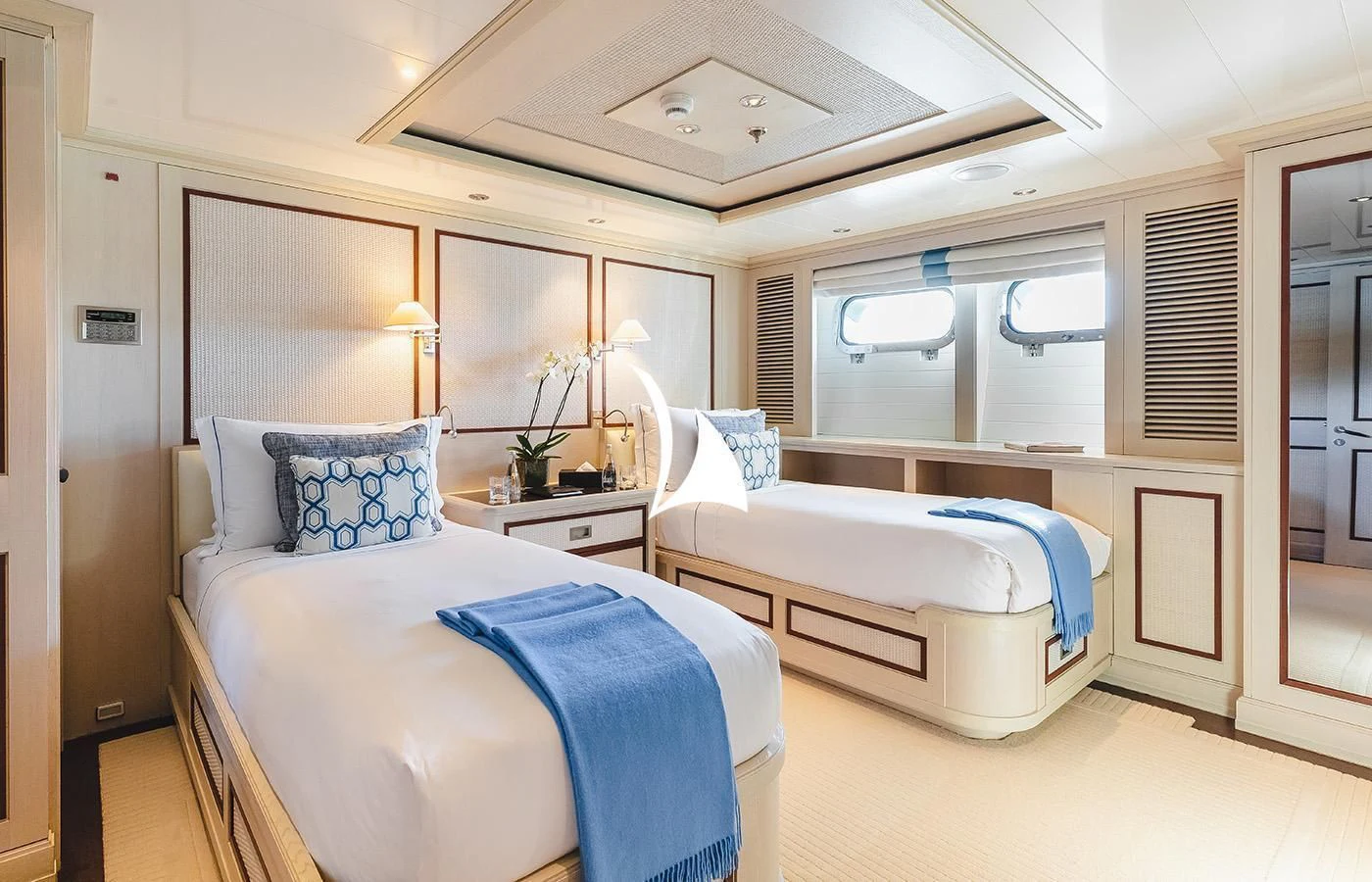 a couple of beds in a room aboard ODESSA Yacht for Charter