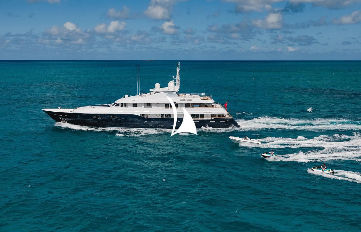 a large white ship in the ocean aboard ODESSA Yacht for Charter