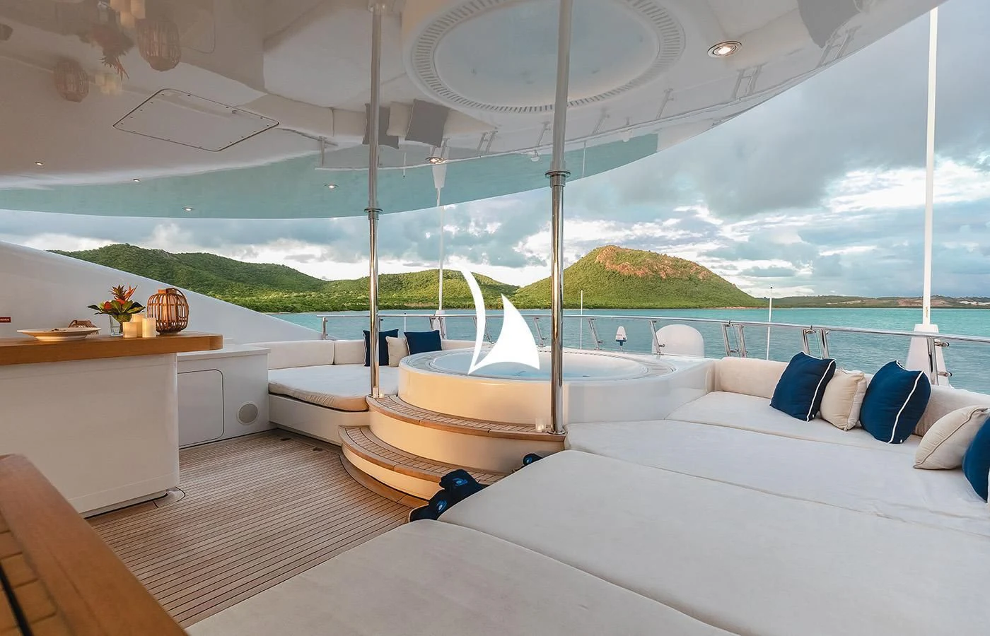 a room with a large bed and a large white tent aboard ODESSA Yacht for Charter