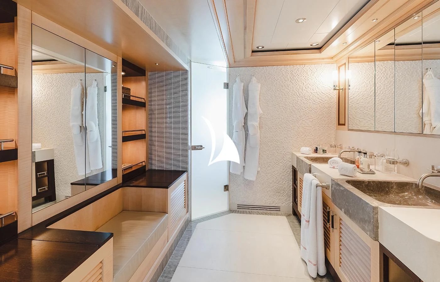 a bathroom with a sink and a shower unit aboard ODESSA Yacht for Charter