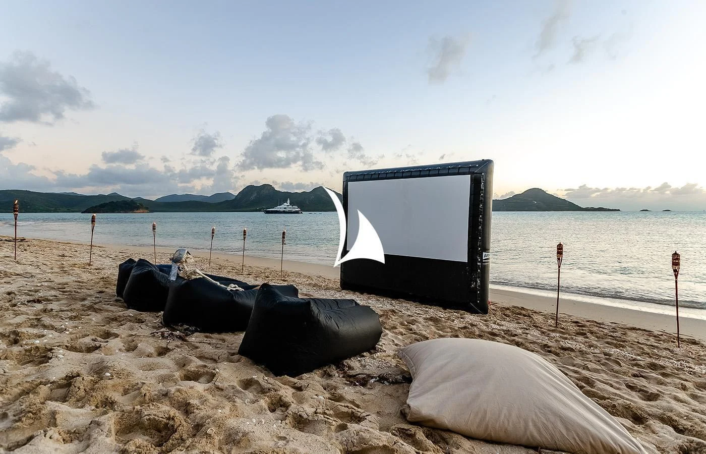 a tv on a beach aboard ODESSA Yacht for Charter