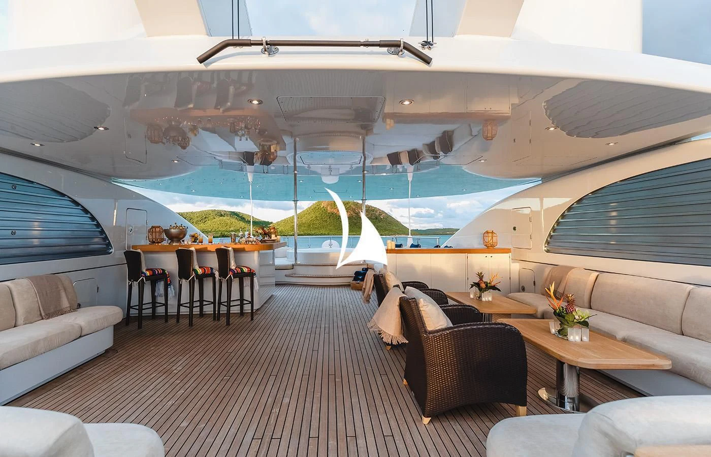 a room with a couch and a table and chairs aboard ODESSA Yacht for Charter