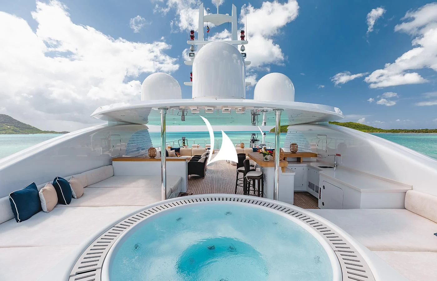 a large white building with a pool aboard ODESSA Yacht for Charter