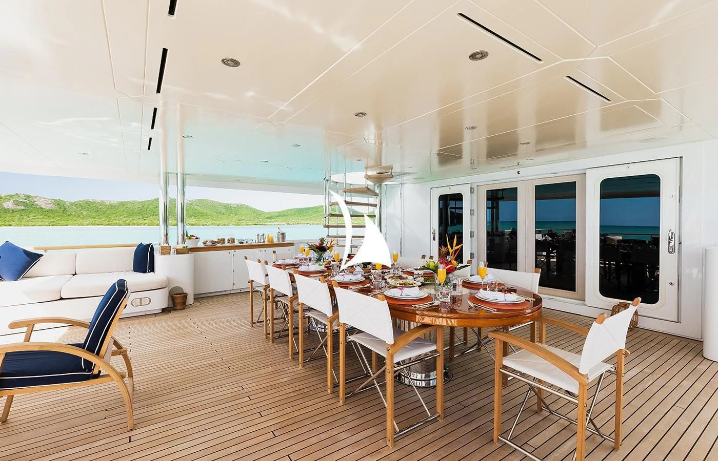a dining area with a table and chairs aboard ODESSA Yacht for Charter