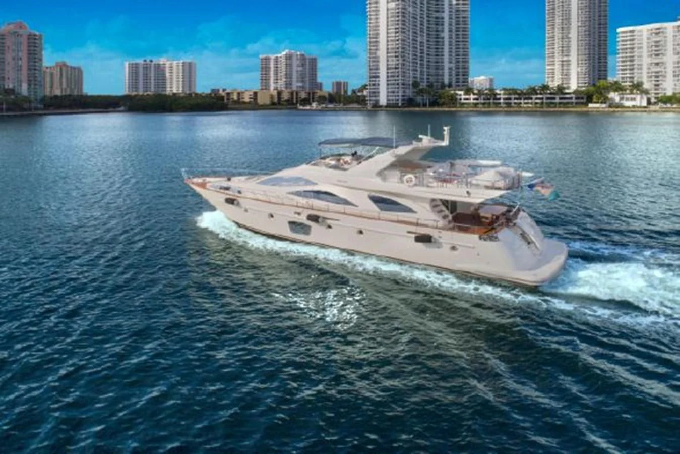 a white yacht on the water aboard PURA VIDA Yacht for Sale