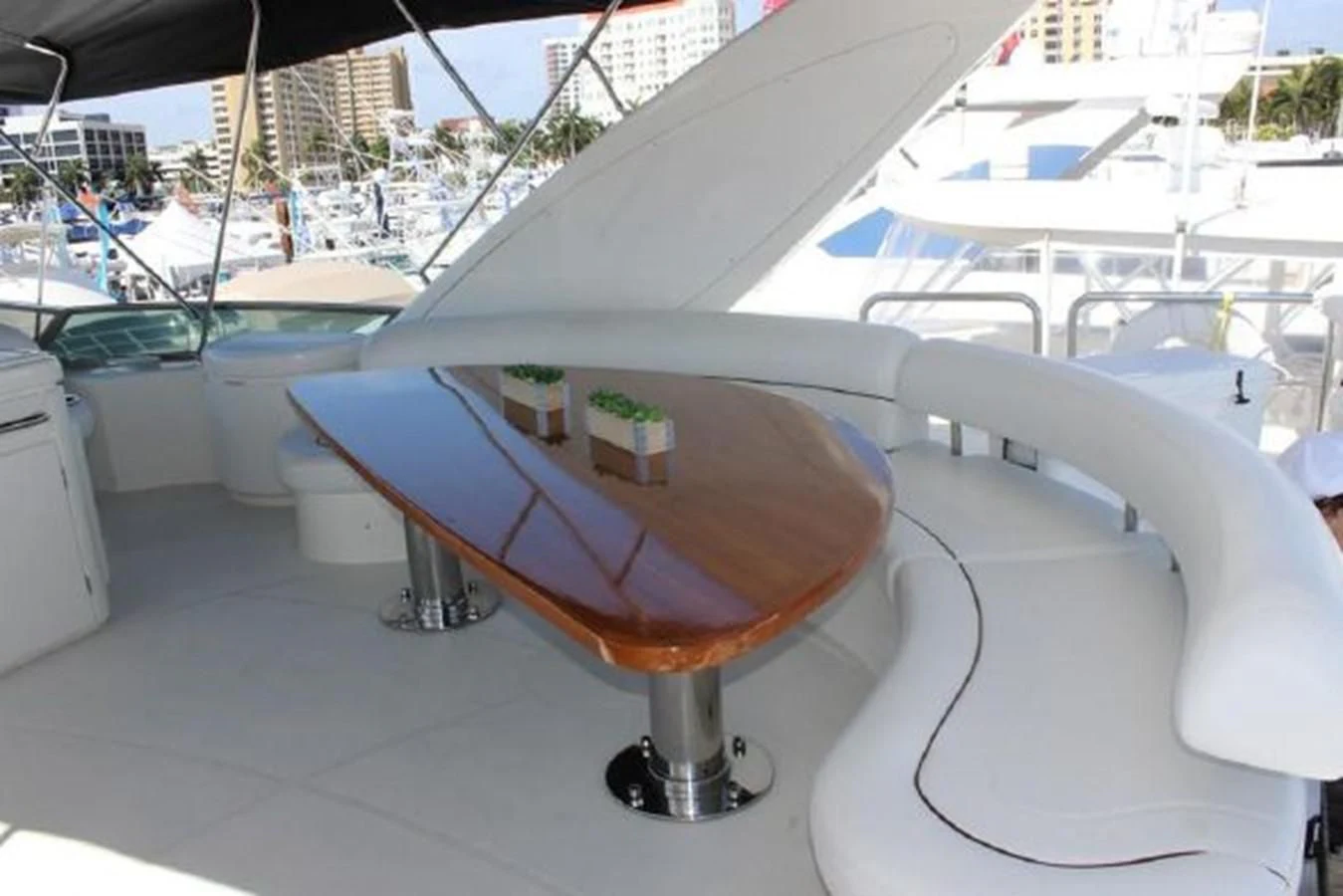 a table with a glass top aboard PURA VIDA Yacht for Sale