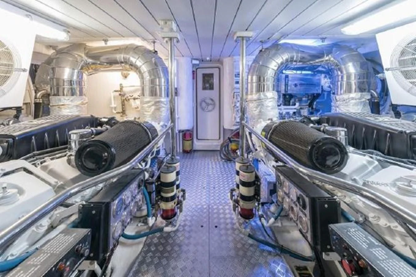 a large machine in a room aboard PURA VIDA Yacht for Sale