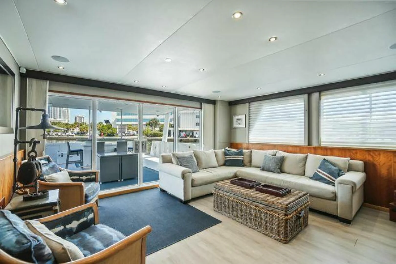 a living room with a blue rug aboard ISLAND SOUL Yacht for Sale