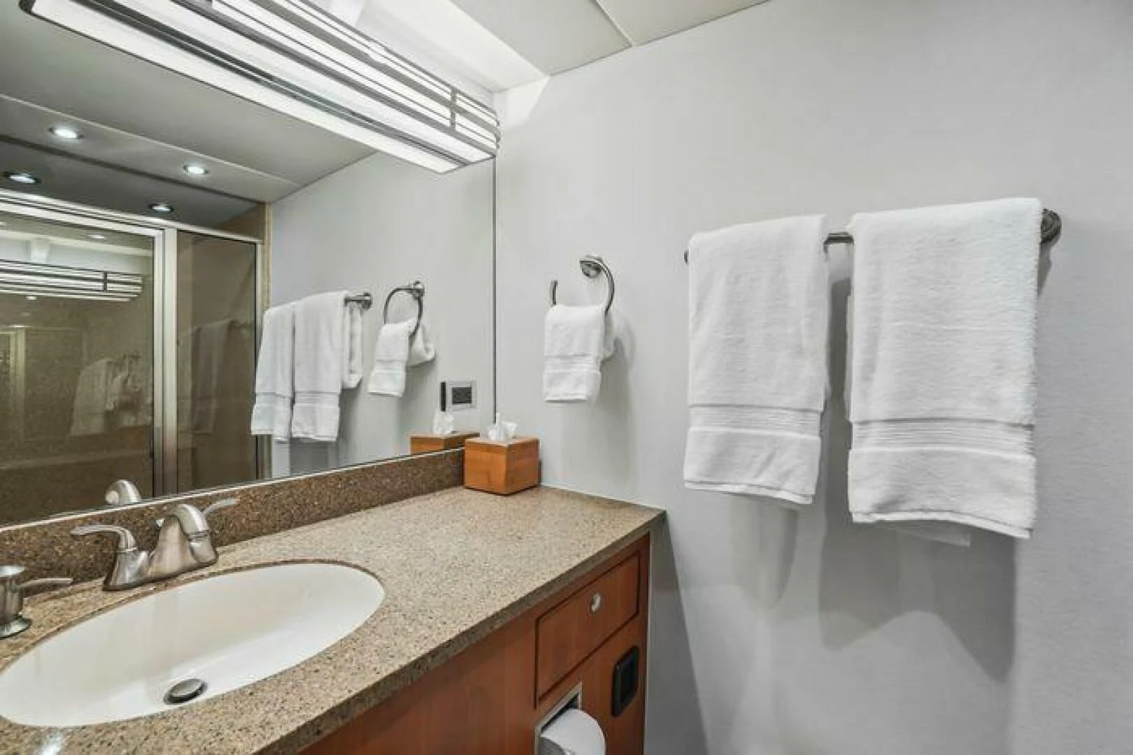 a bathroom with a countertop sink and towels aboard ISLAND SOUL Yacht for Sale